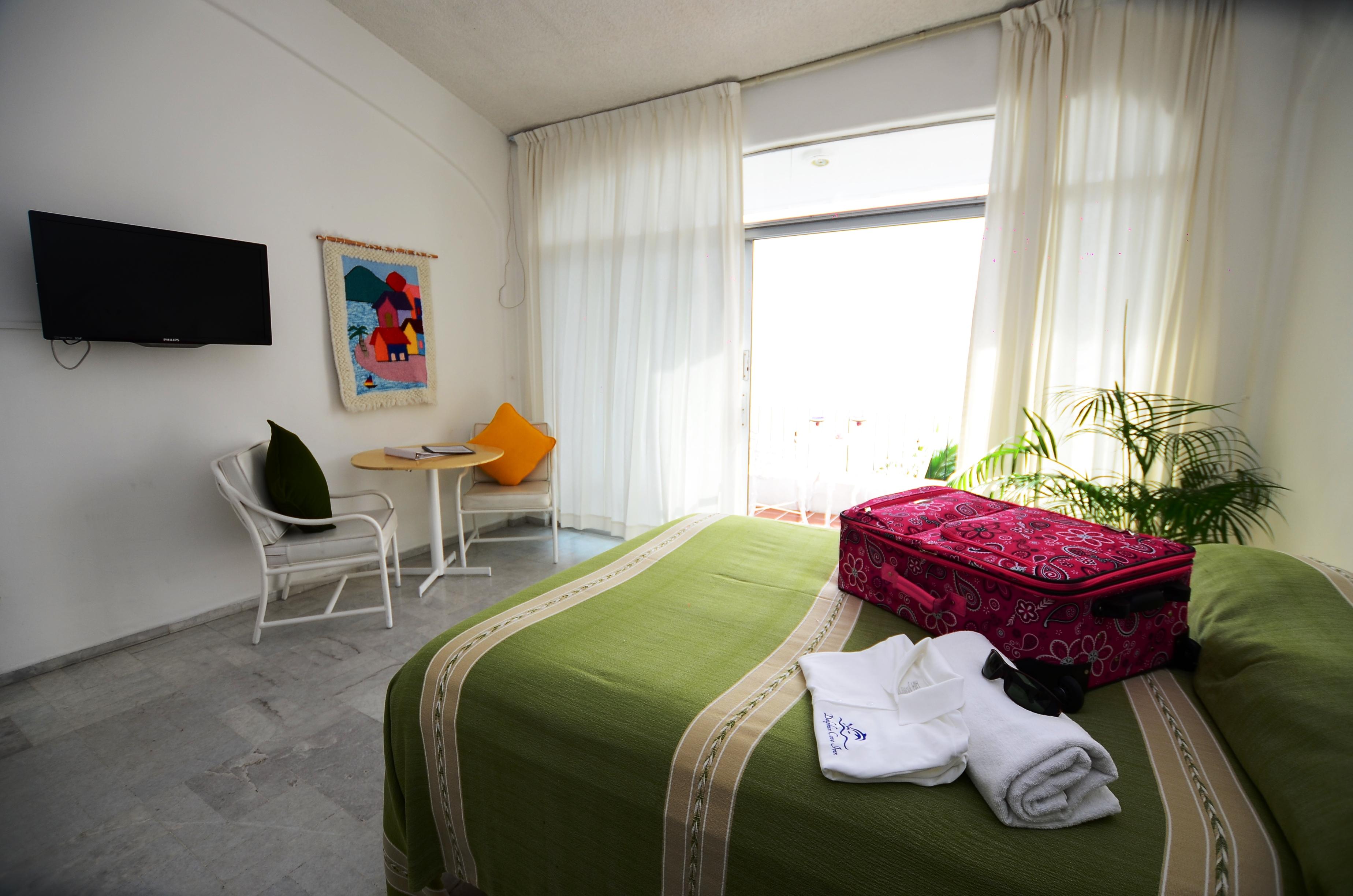 Dolphin Cove Inn Мансанильо Экстерьер фото