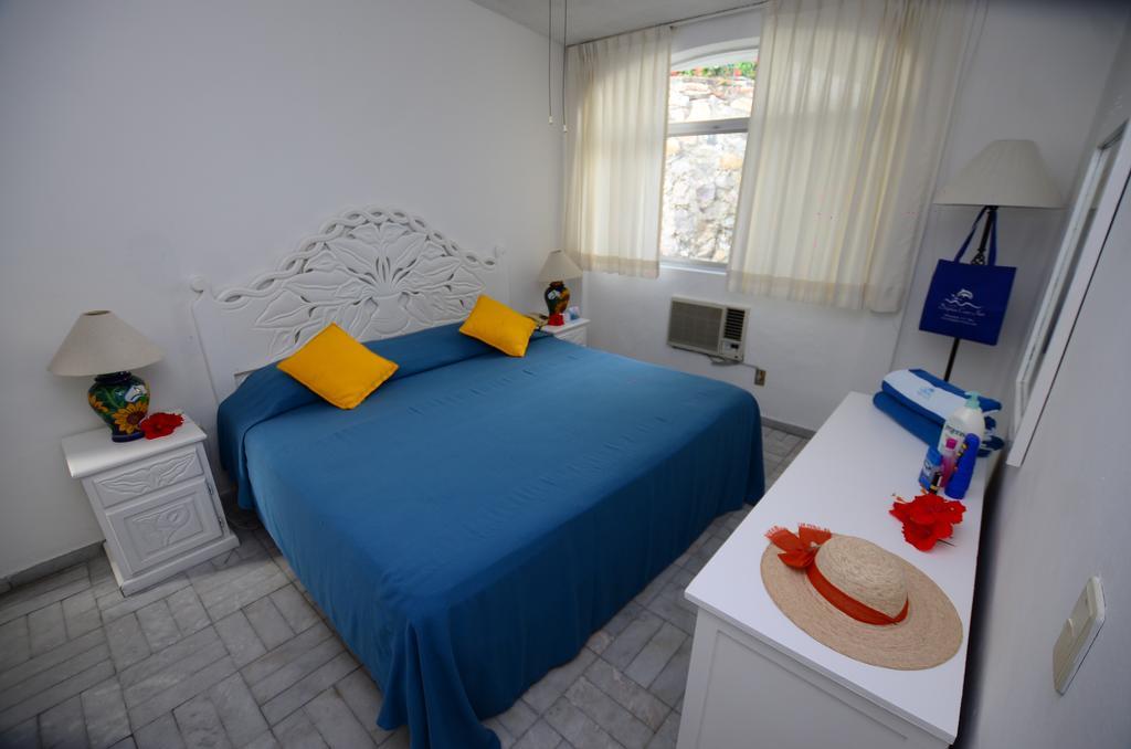 Dolphin Cove Inn Мансанильо Экстерьер фото
